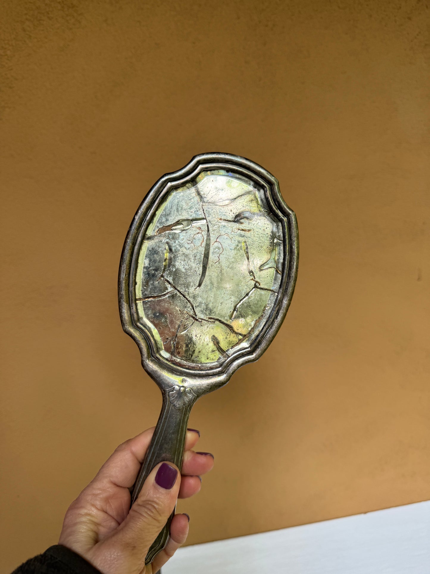 Antique French Hand Mirror with Cracked Glass and Ornate Handle