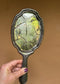 Antique French Hand Mirror with Cracked Glass and Ornate Handle