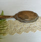 Antique French Hand Mirror with Cracked Glass and Ornate Handle