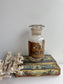 Antique Apothecary Jar – RHEI PULV Glass Bottle with Worn Label