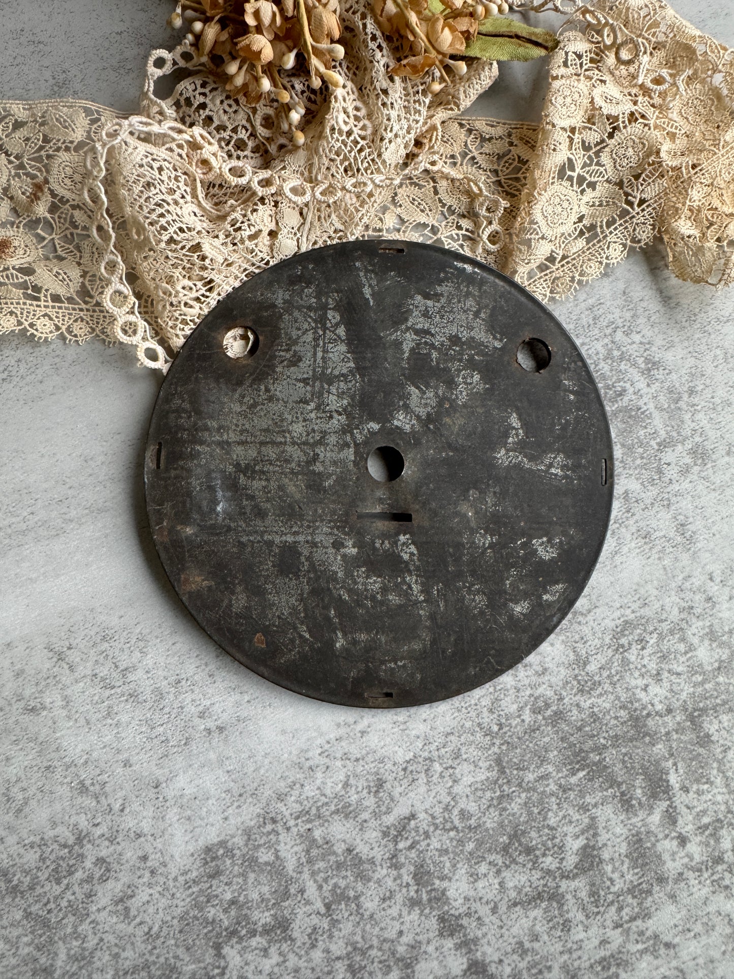 Antique Clock Face with Aged Patina and Elegant Details