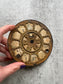 Antique Clock Face with Aged Patina and Elegant Details