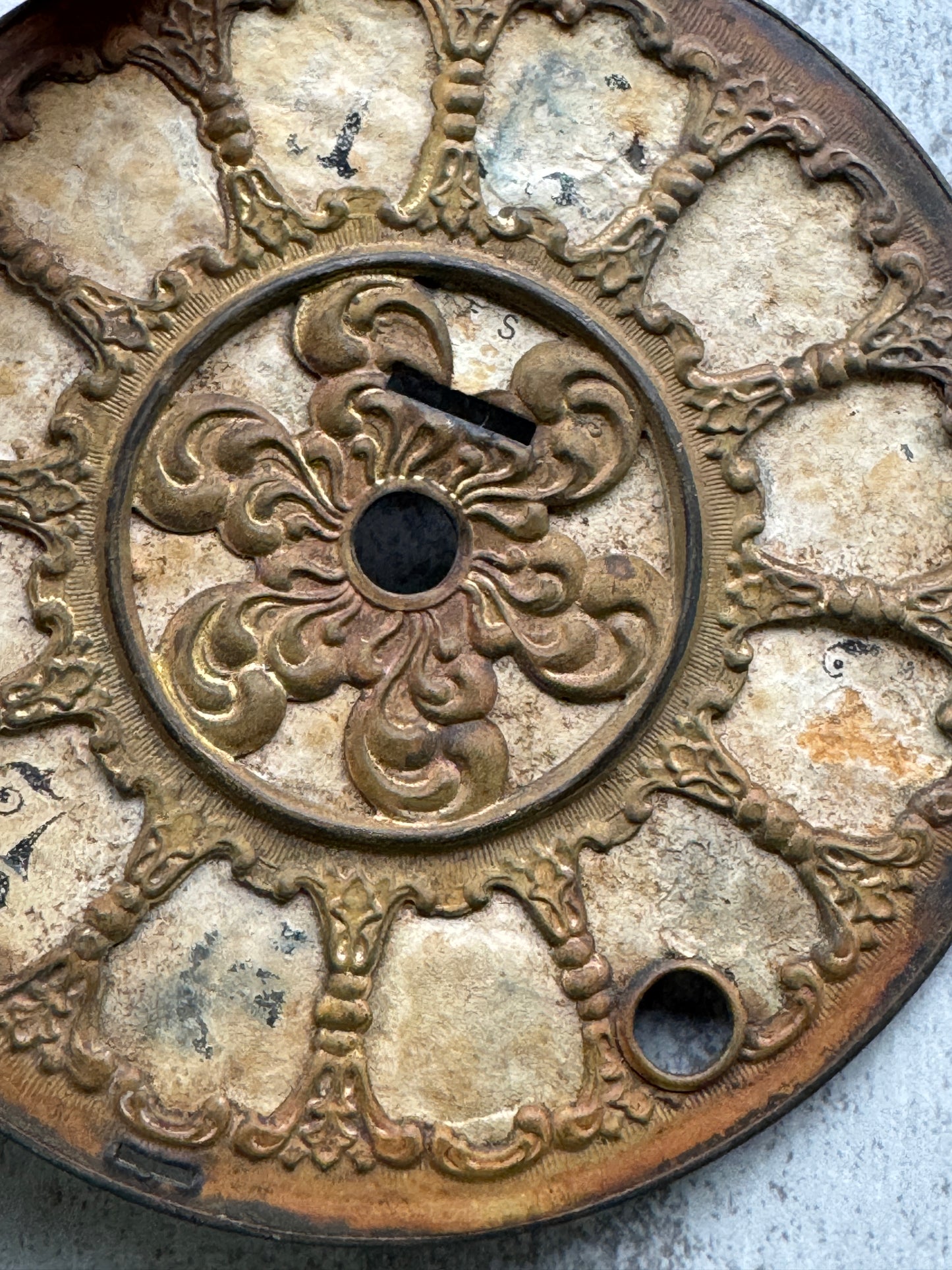 Antique Clock Face with Aged Patina and Elegant Details